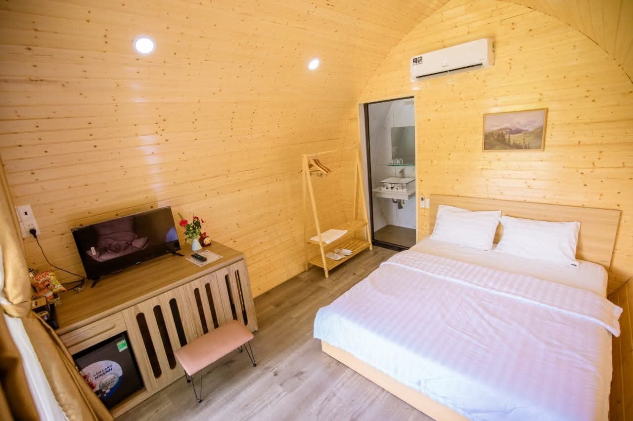 Giường ngủ trong nhà gỗ